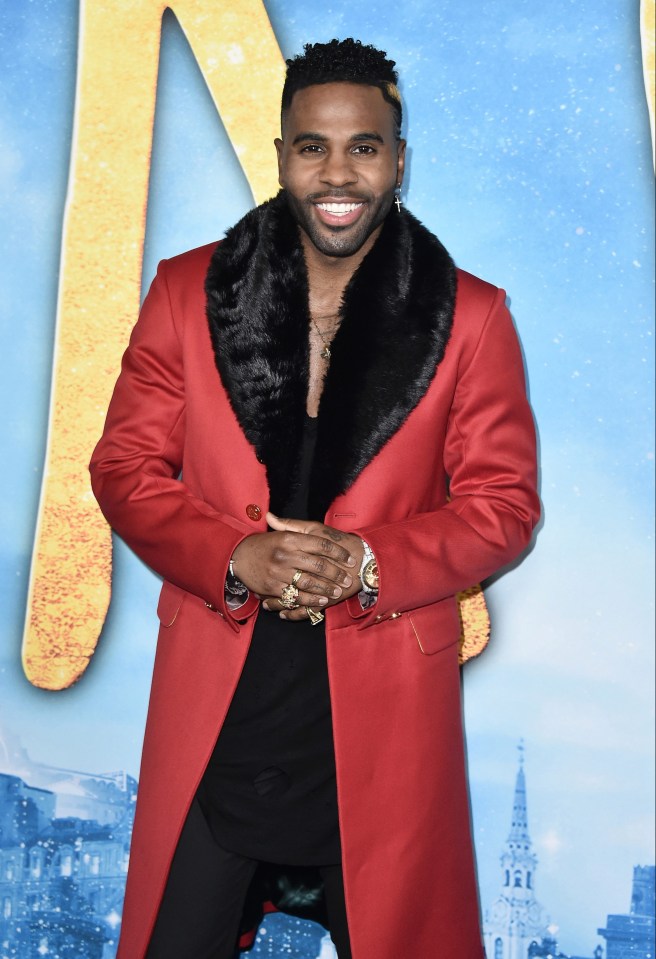 Jason Derulo flashed a smile at the cameras during the premiere