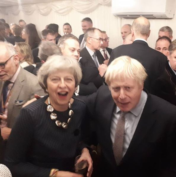  Boris Johnson and Theresa May hug and make up to celebrate Tory win