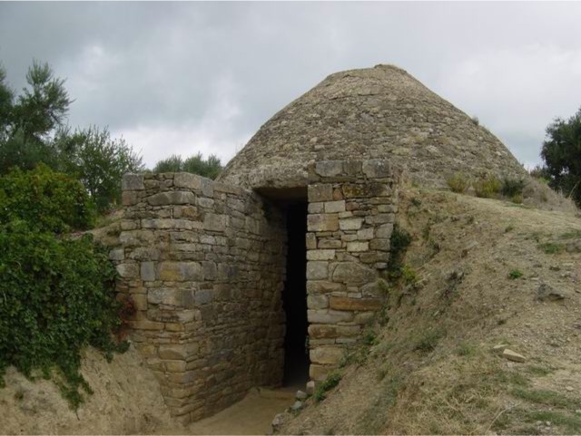  Nearby tomb Tholus IV shows what the other burial chambers would have looked like from the outside