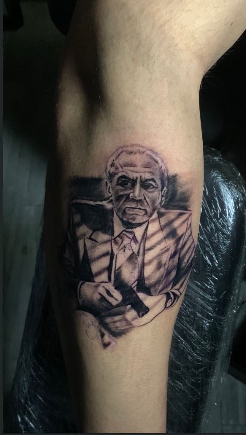  Lewis has got a tattoo of Lord Sugar holding a gun