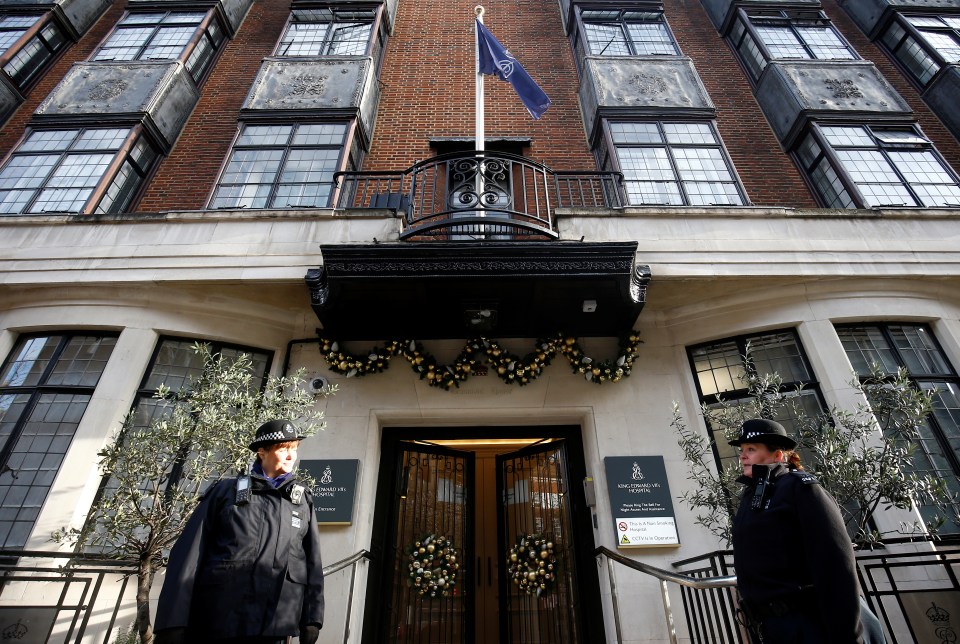  Police officers stand outside King Edward VII's Hospital, where Britain's Prince Philip was admitted