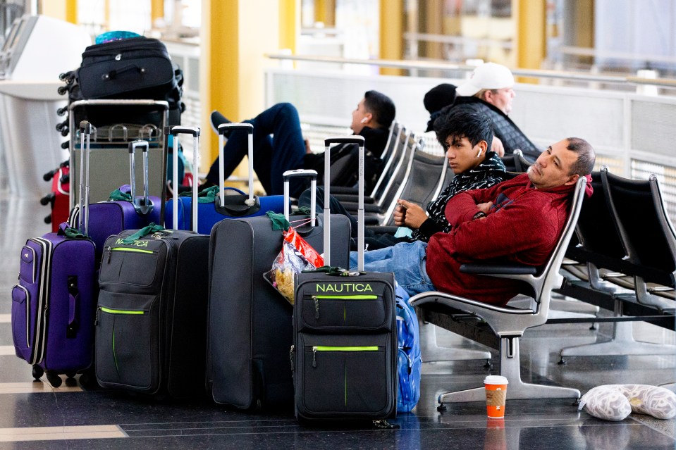 Hundreds of flights were delayed across the country due to wet and wintry weather