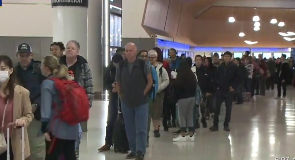 Thousands of fliers lined up in queues snaking around San Francisco International Airport early Monday morning