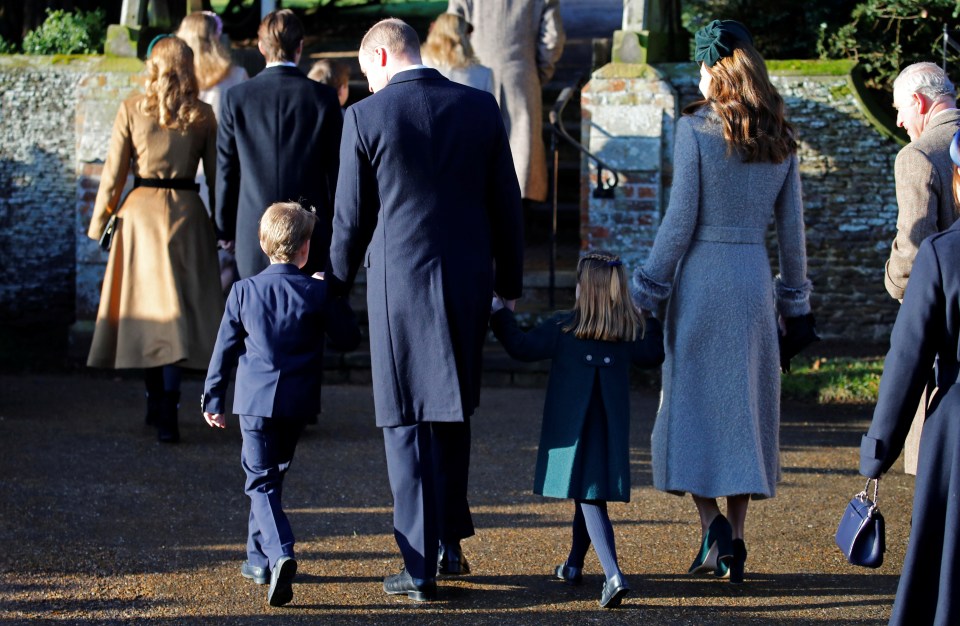  George and younger sister Charlotte walked the short distance from Sandringham House to St Mary Magdalene Church hand in hand with their parents the Duke and Duchess of Cambridge