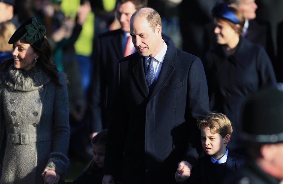  Prince William and Prince George make their way to the church for the Royal Family's Christmas Day service