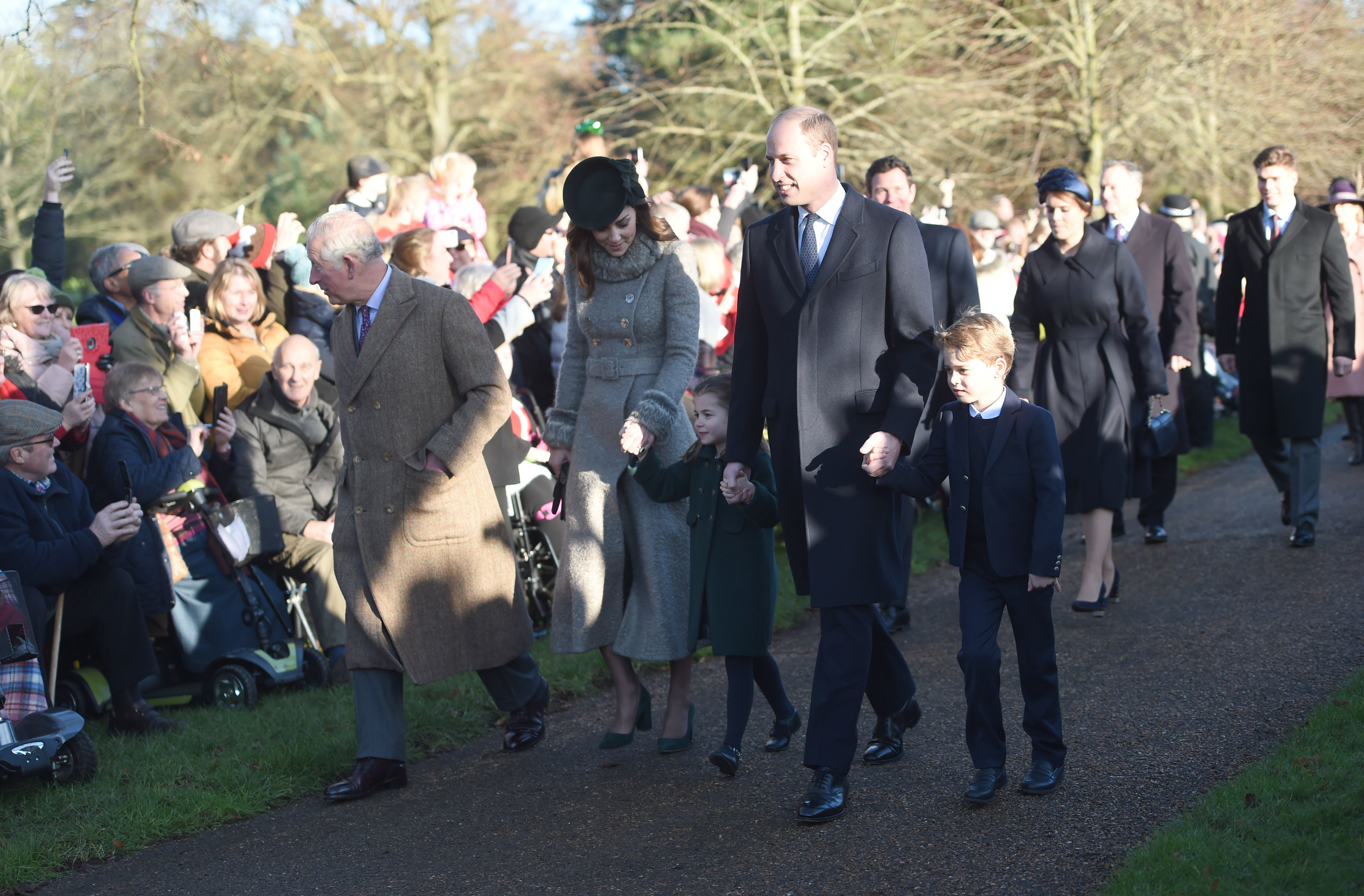 They walked hand-in-hand with parents, Will and Kate