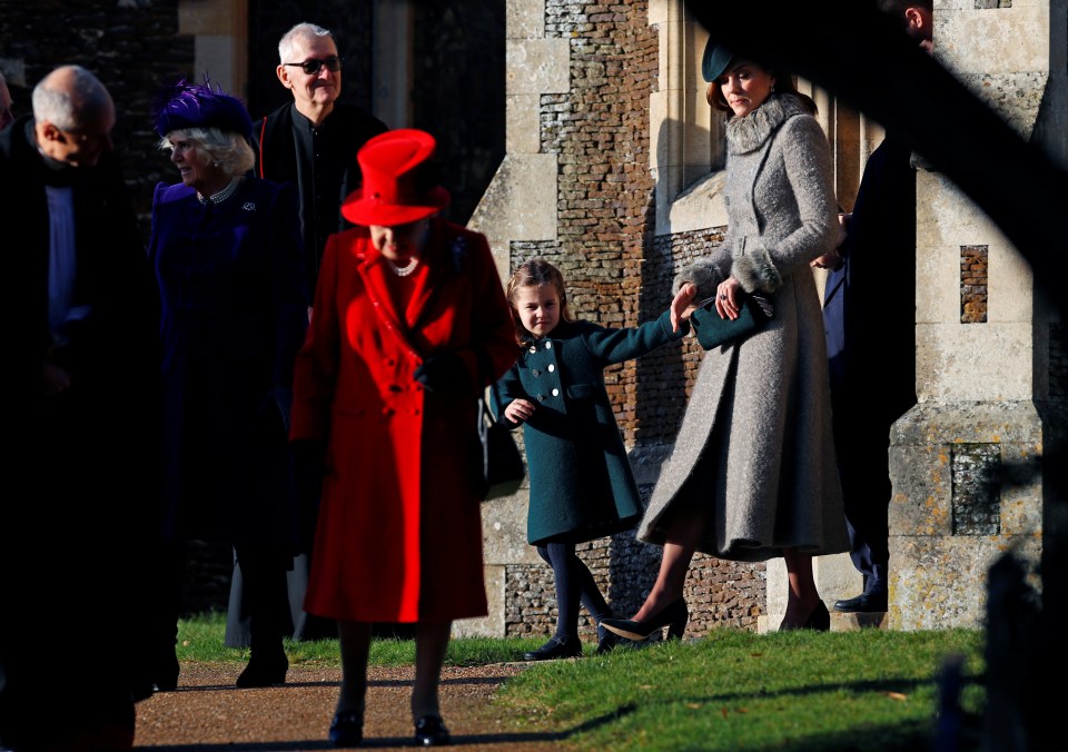  Princess Charlotte and Kate leave the church hand in hand