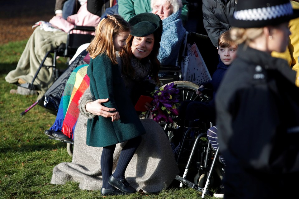  Princess Charlotte with her mum Kate outside St Mary Magdalene's church