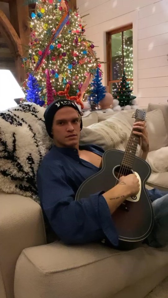  Cody, 22, was pictured by Miley playing the guitar on Christmas