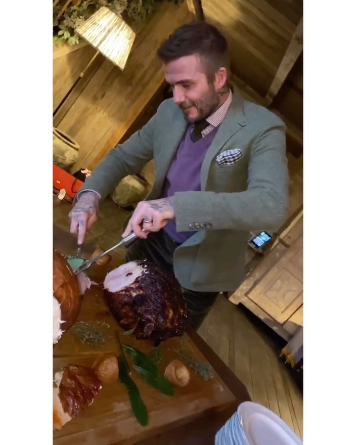  David looked dapper as he cut the turkey