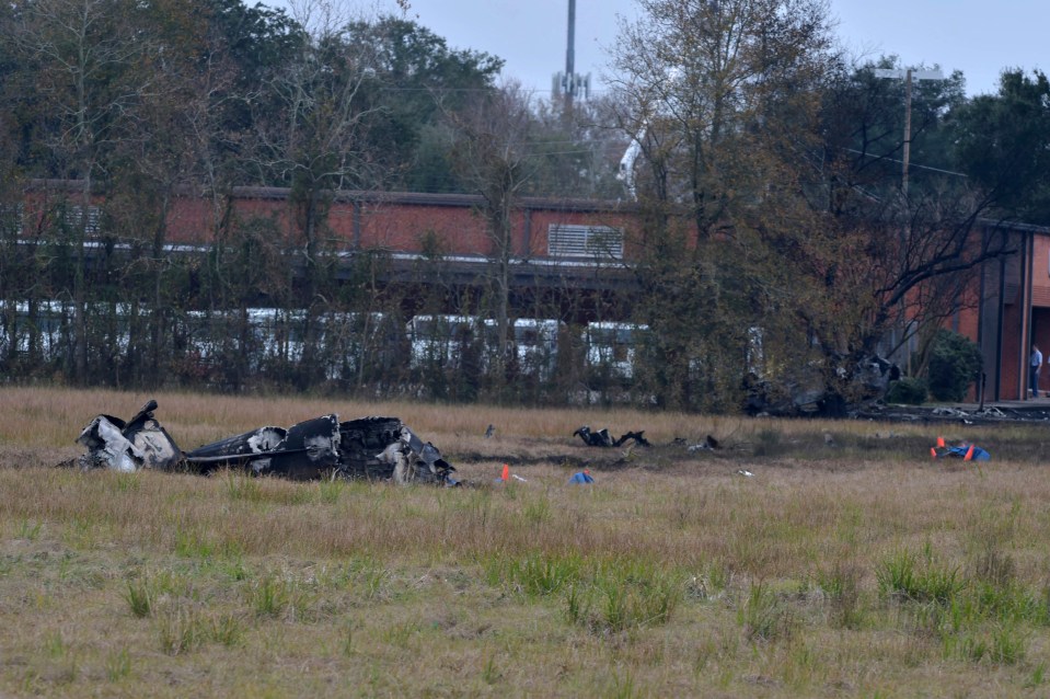  A view of the wreckage near a Walmart and US Post Office building