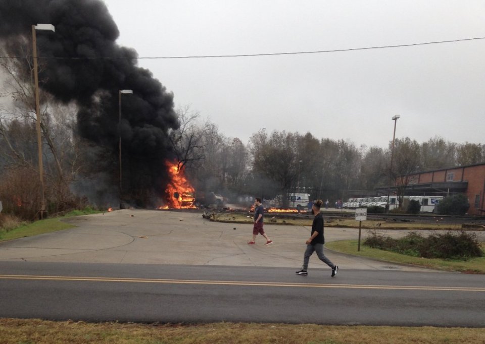  A fireball engulfed the plane after it crashed in a car park