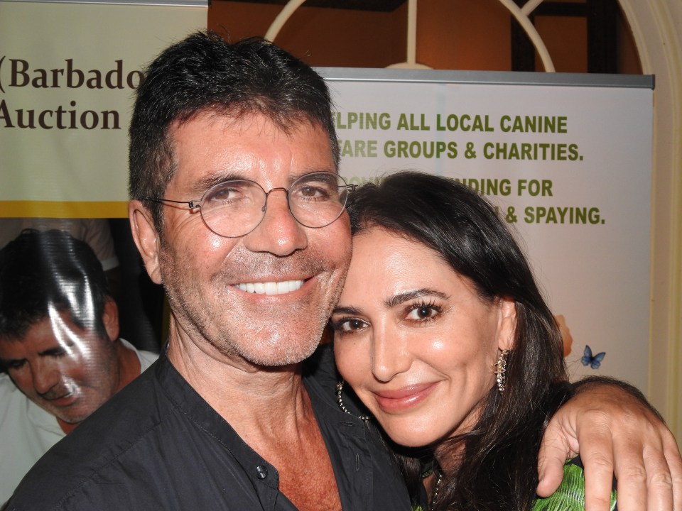  Simon Cowell and girlfriend Laura Silverman attended a dog charity event