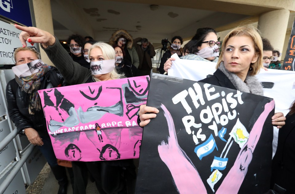  Supporters of the teenager waved banners and wore stitched-lip masks outside the court