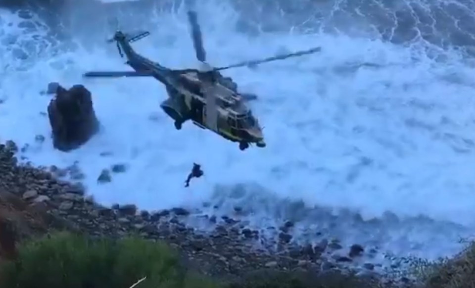 Rescuers used a helicopter to winch her to safety