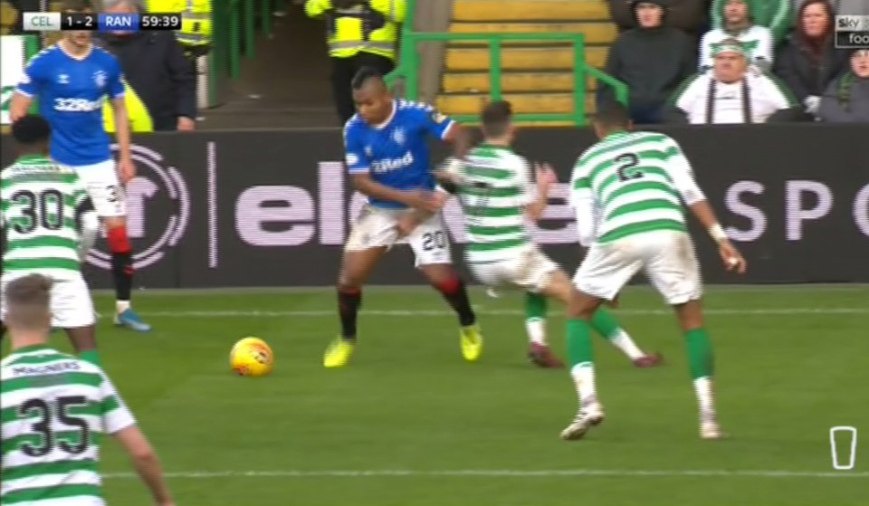  Ryan Christie gets hold of Alredo Morelos in Sunday's derby clash