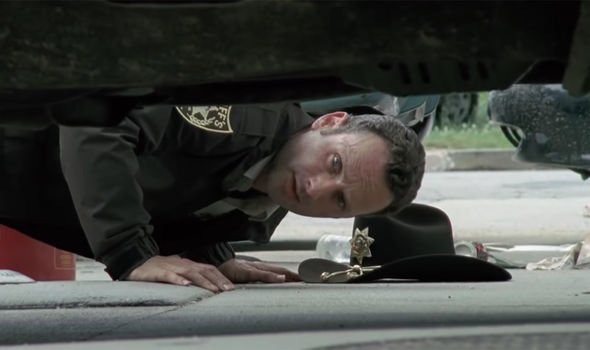 Rick saw the little girl's feet from under a car