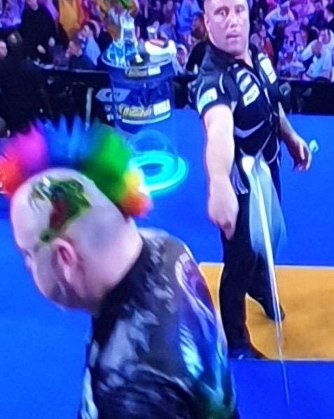  Gerwyn Price threw a practice dart close to Peter Wright's head before their grudge match