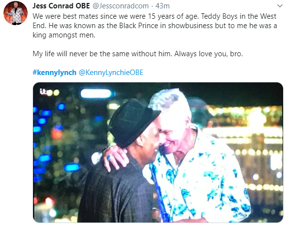  Jess Conrad shared a touching photograph of him hugging the singer and actor