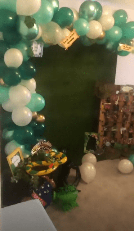  The house was filled with jungle inspired decorations including a snake and green walls