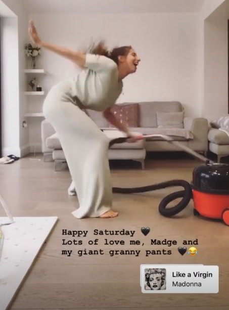 Stacey got to work hoovering in their grey and cream lounge