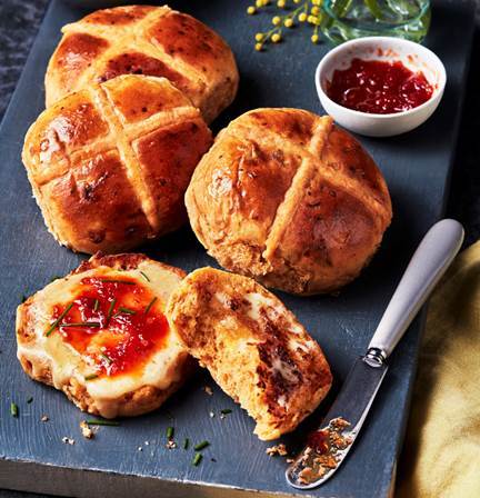  Until Saturday you can get your hands on M&S' new chilli and cheese hot cross buns for just £1 for a pack of four