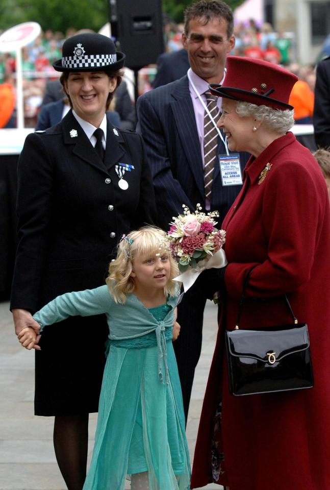  Daughter Lydia meets the Queen in 2007