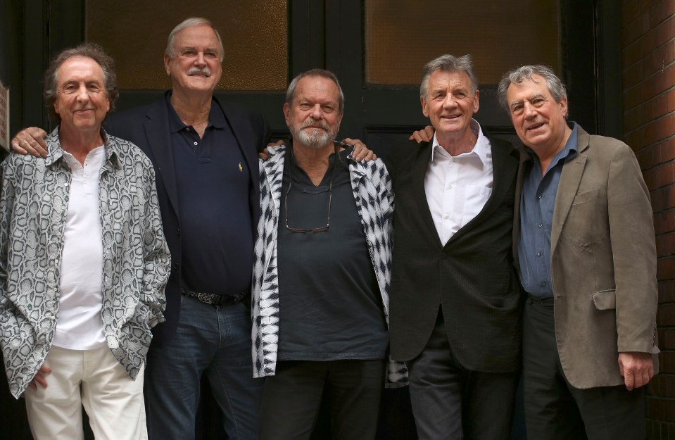  John strikes a pose with the surviving Pythons before the 2014 reunion shows