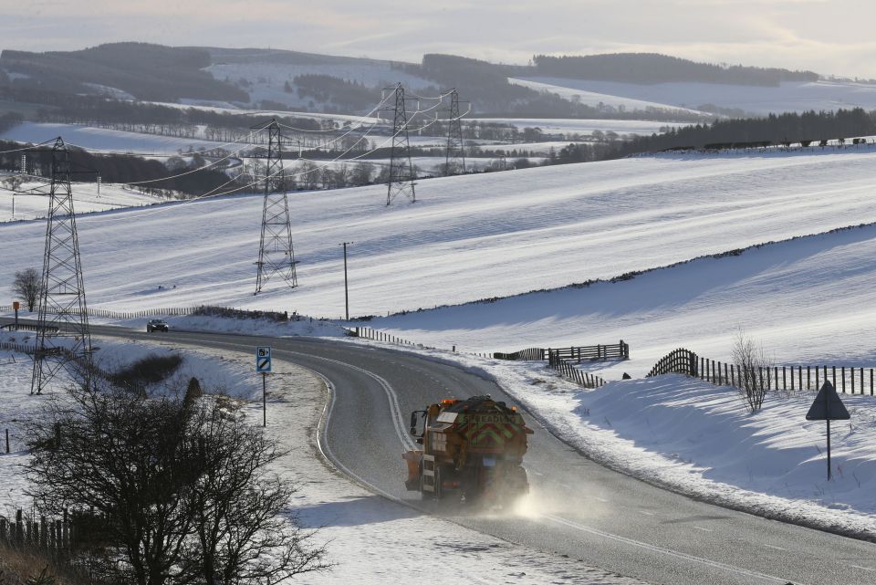 A gritter on a road in Scotland in 2018