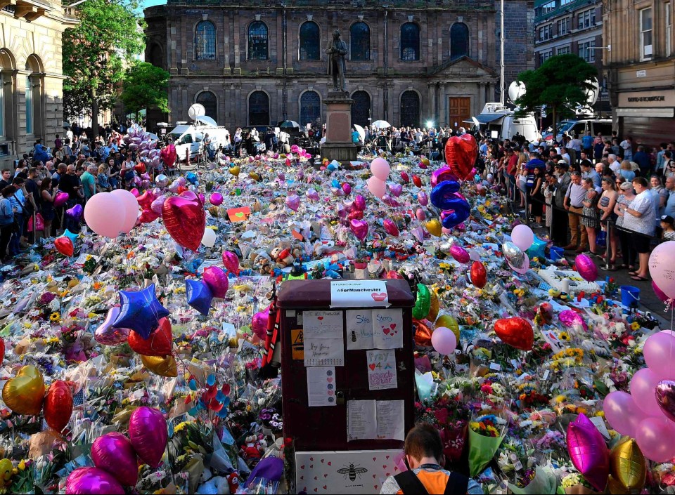 Manchester’s St Ann’s Square was filled with flowers and tributes after the attack