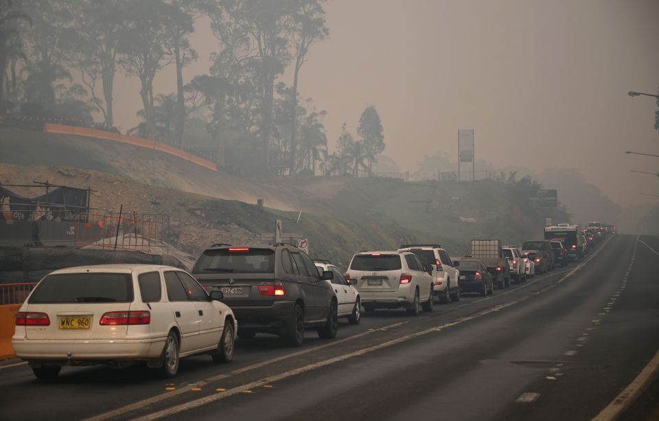  Traffic was jammed on highways out of threatened areas of New South Wales as desperate families and holidaymakers queued to escape