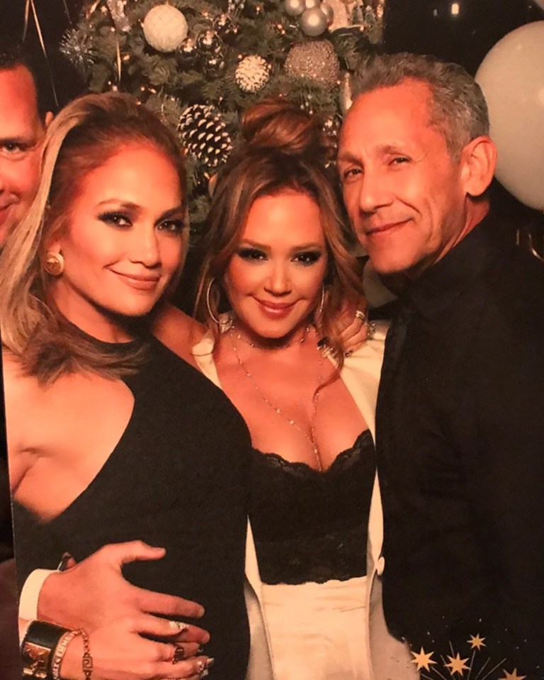  Leah Remini posted a photo showing her and husband Angelo Pagan cuddling up to Jen - with Alex on the edge of the snap