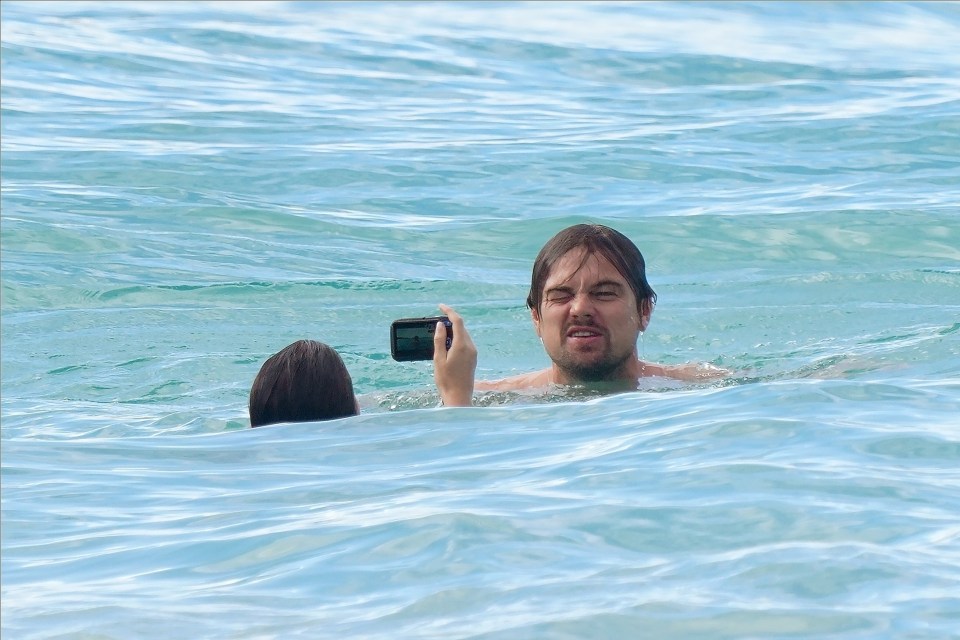  The couple were pictured having fun in the sea