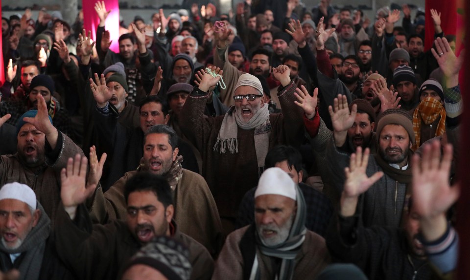  Kashmiri Shiite Muslims shout anti American and Israeli slogans during a protest