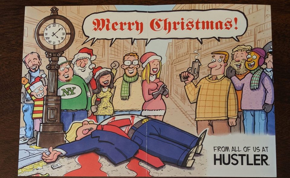  The controversial card shows civilians cheering around a figure of a wounded Trump