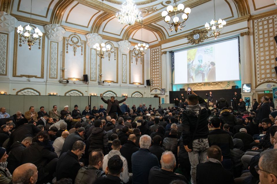  Saturday's service was held hours before the body of Soleimani landed back in his home country