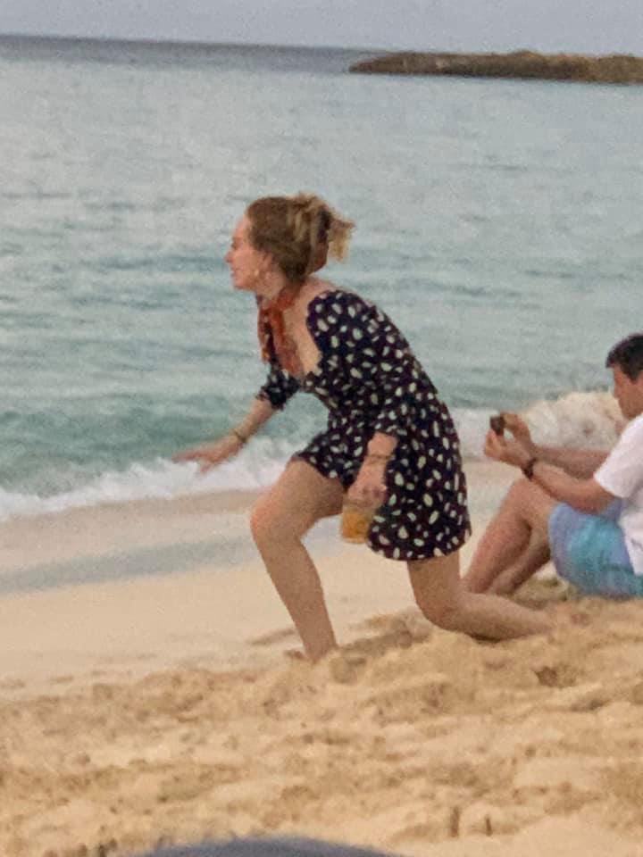 She was spotted romping around on the sand in a polka-dot dress