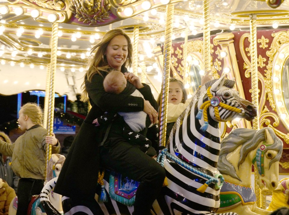 Mylenne held onto Apollo on the carousel