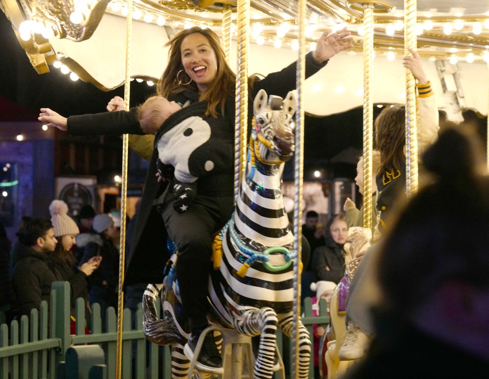 Myleene Klass took son Apollo on a carousel at Winter Wonderland