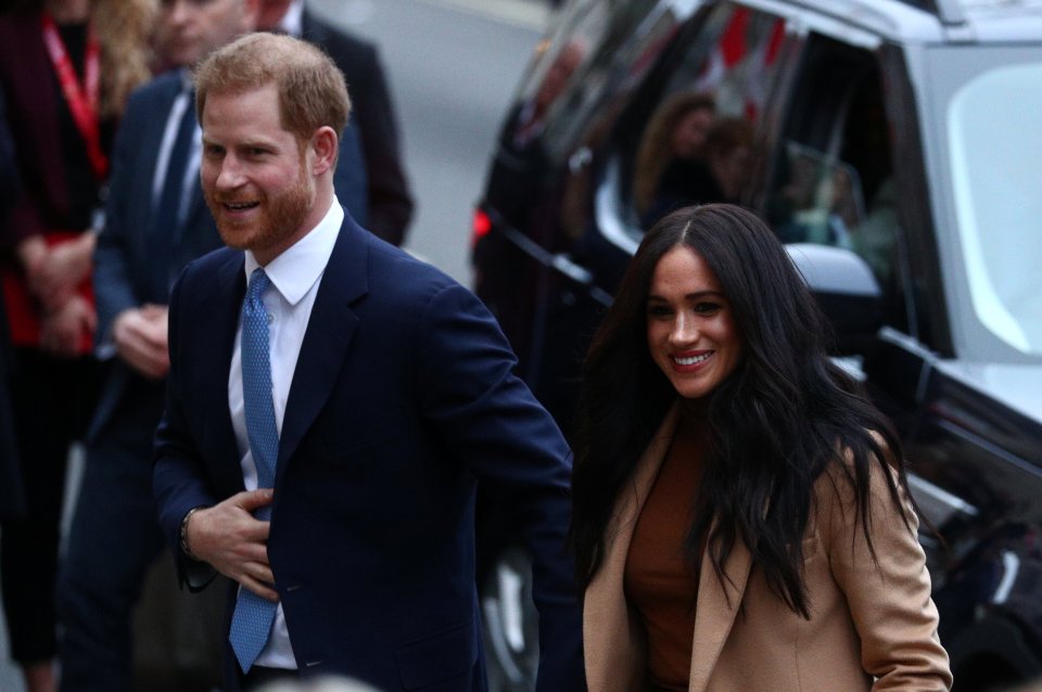  The couple seemed happy to be back in London as they visited Canada House