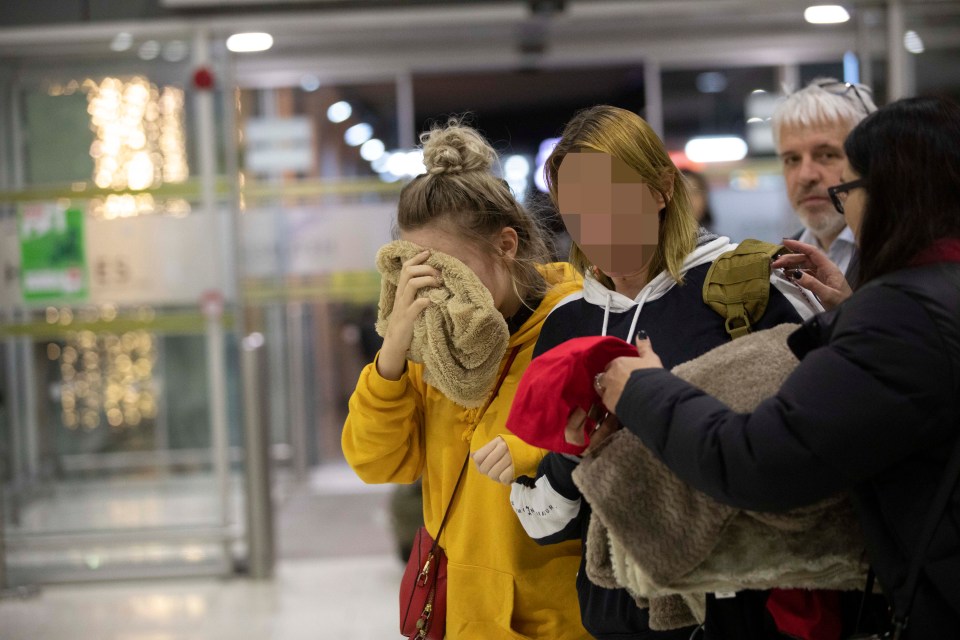 The young woman was photographed with her mother on Tuesday night at the airport in Cyprus