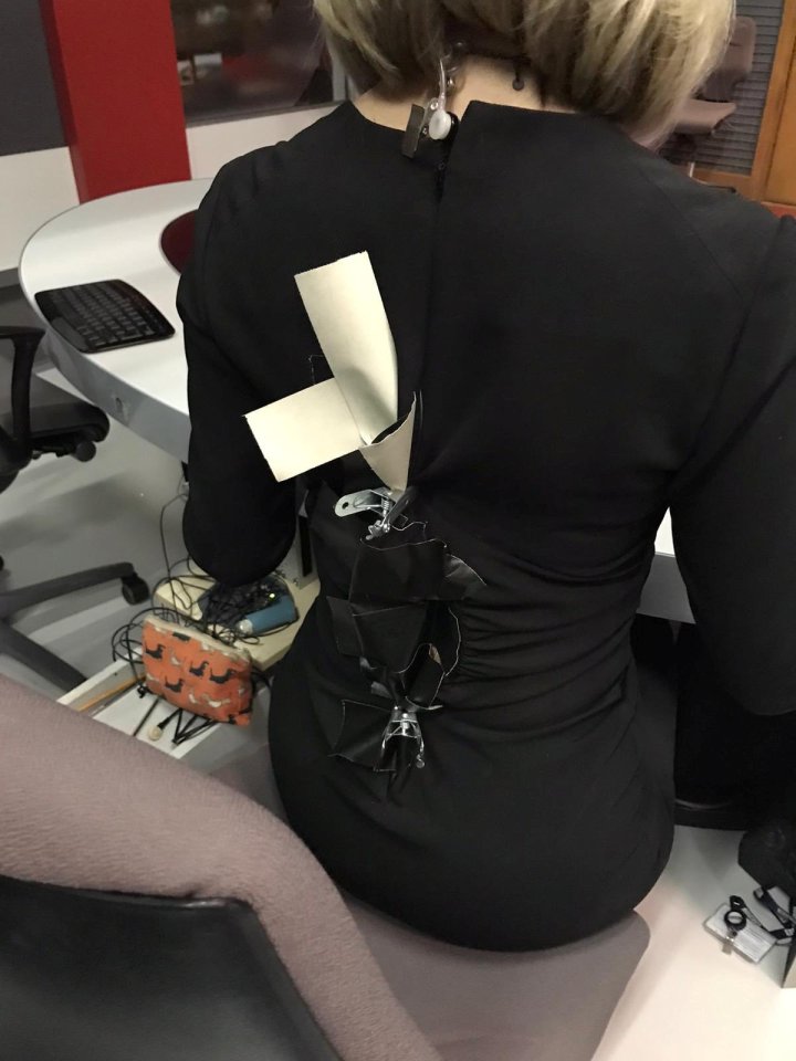  Quick-thinking colleagues used gaffer tape and bulldog clips to temporarily repair the dress