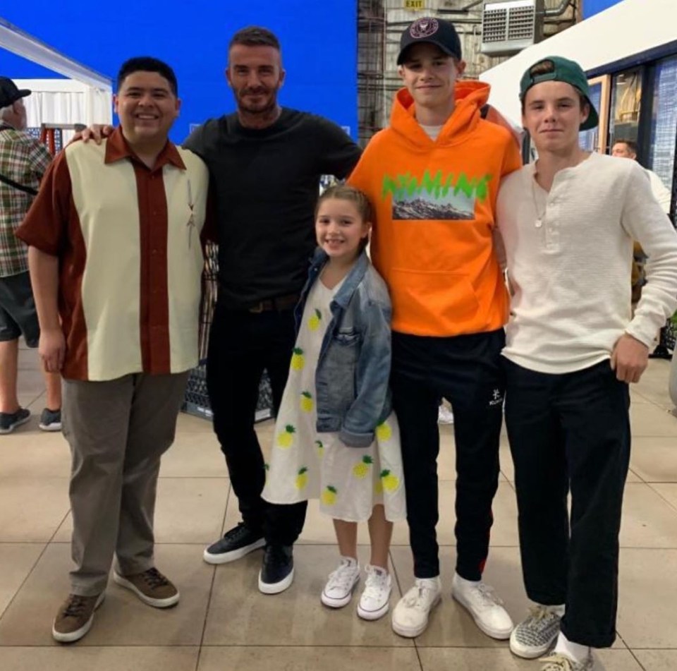  David and his family posed with Modern Family actor Rico Rodriguez