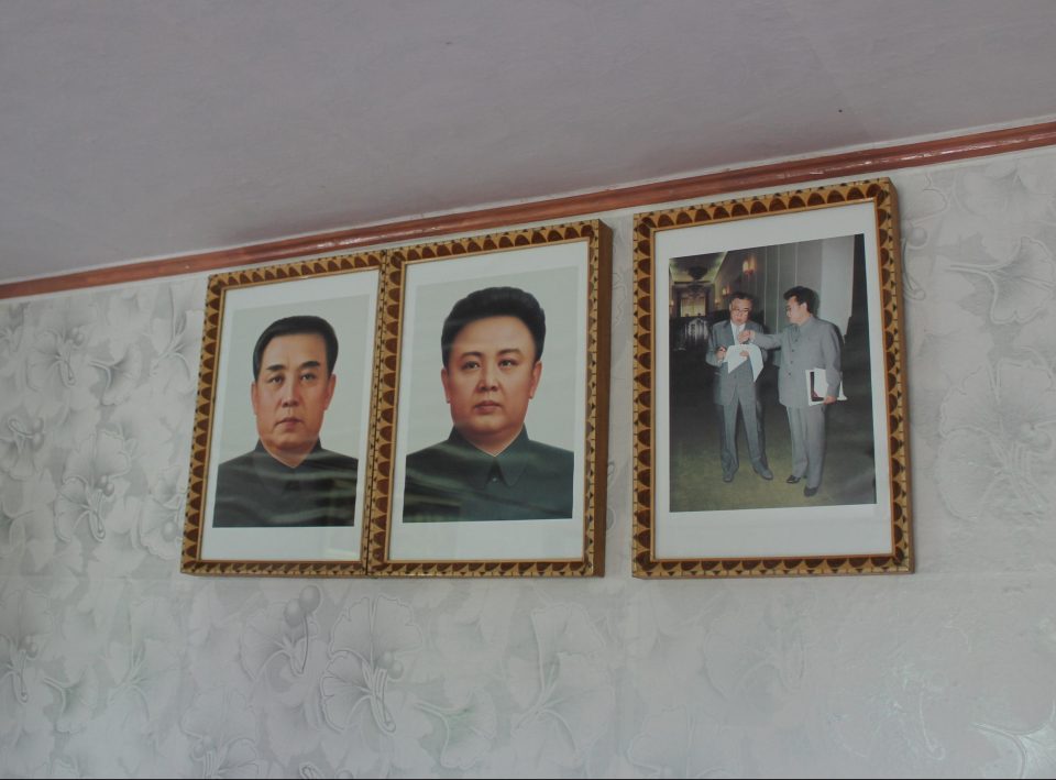  Portraits of Kim Jong-il and Kim Il-sung on a North Korean living room wall (file image)