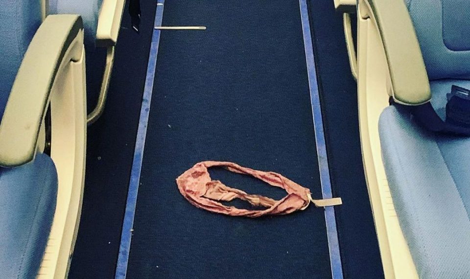 A disgusting passenger left their dirty knickers on the aisle of a plane