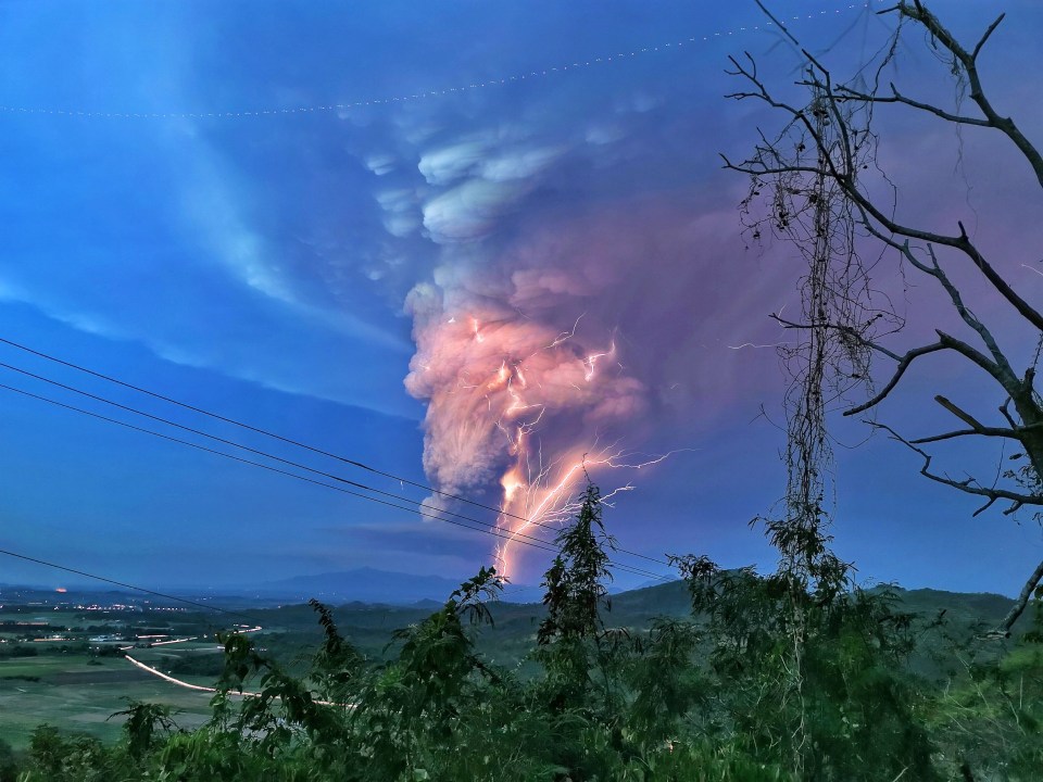 A terrifying cloud of ash is lit up by rare volcanic lightning