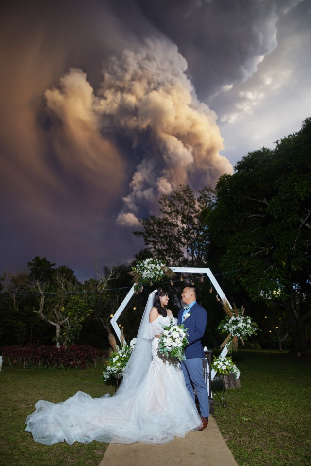 One couple got married with the volcano erupting in the background