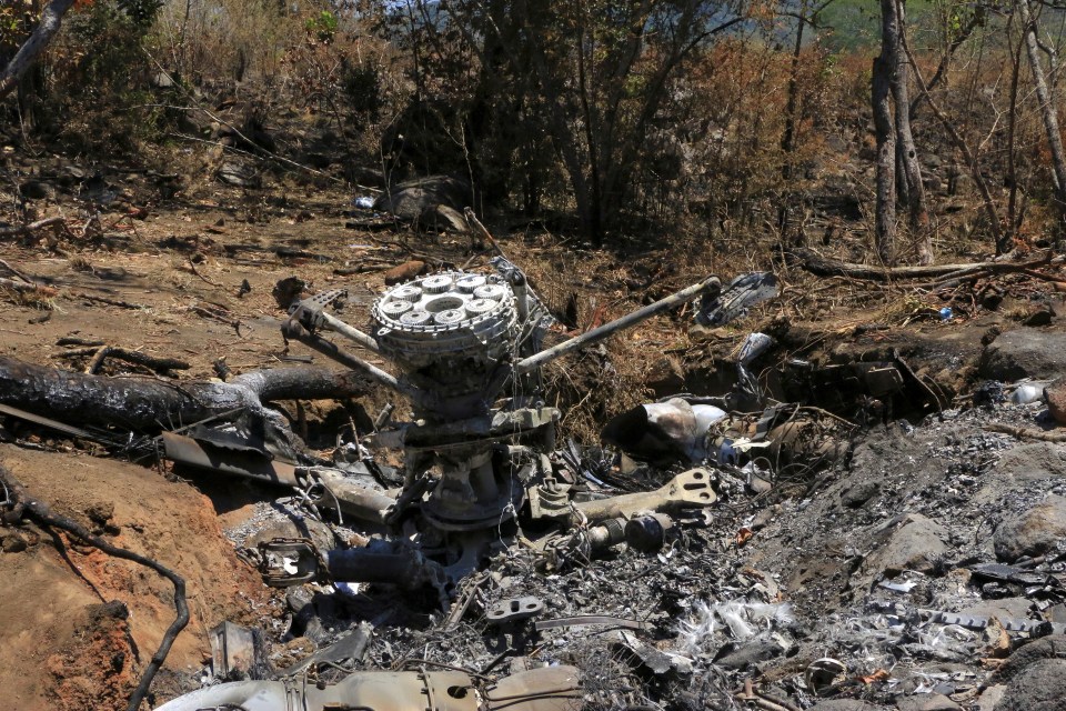 The twisted wreckage of a military helicopter shot down by the cartel in 2015