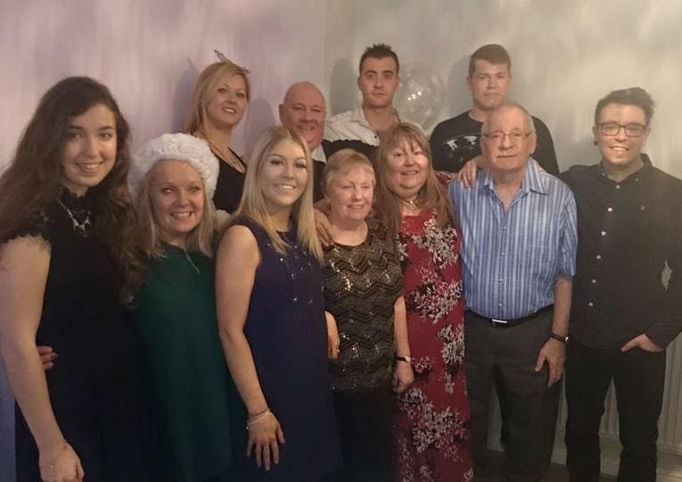  Mavis and Dennis with their children, including Joy (front row, second left) and grandchildren