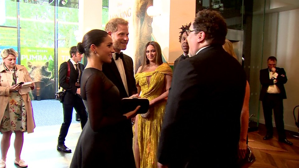 Meghan Markle was seen grinning at the premiere of the Lion King as Harry touted the couple for voiceover roles to Jon Favreau